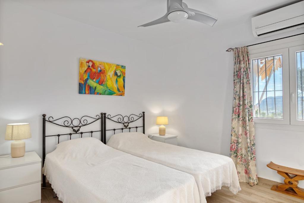 Postel nebo postele na pokoji v ubytování Casa Cacteae