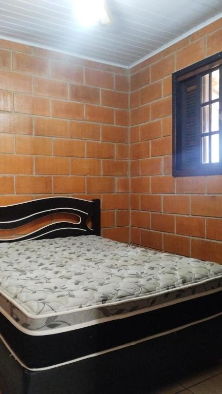 Postel nebo postele na pokoji v ubytování Chácara Canto Verde Atibaia