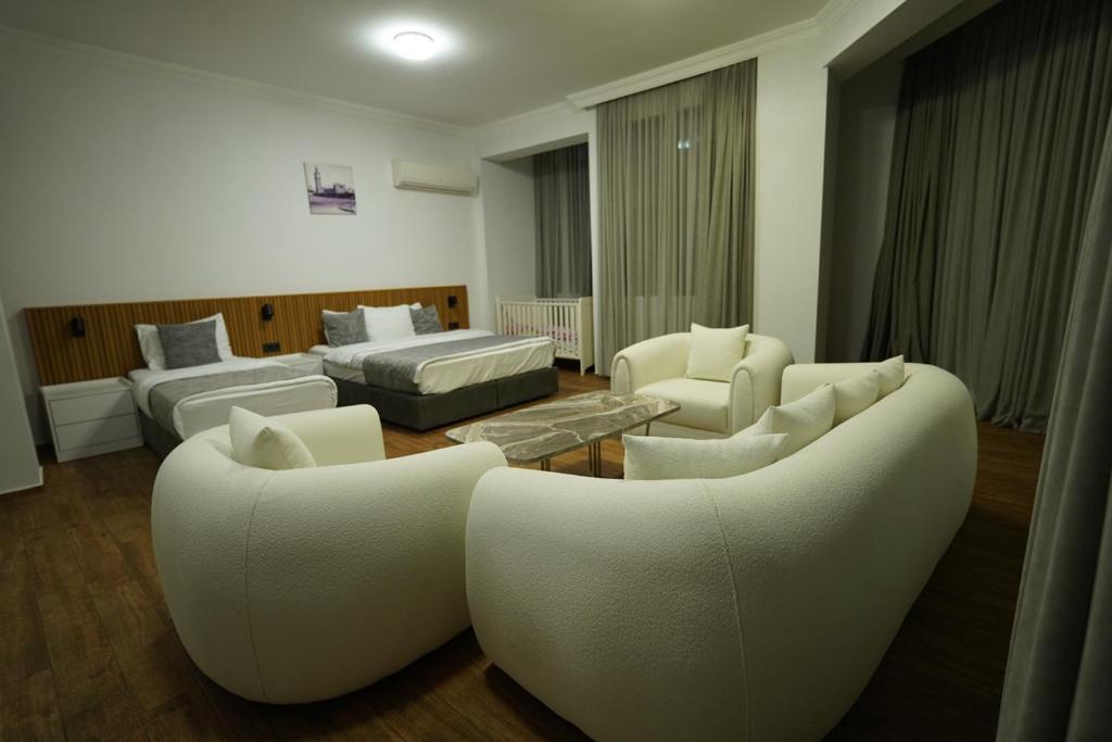 Postel nebo postele na pokoji v ubytování Hotel Old Town