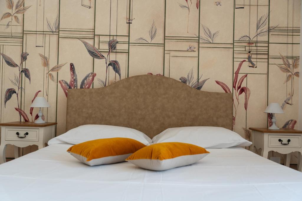 Posteľ alebo postele v izbe v ubytovaní B&B Donna Cinzia