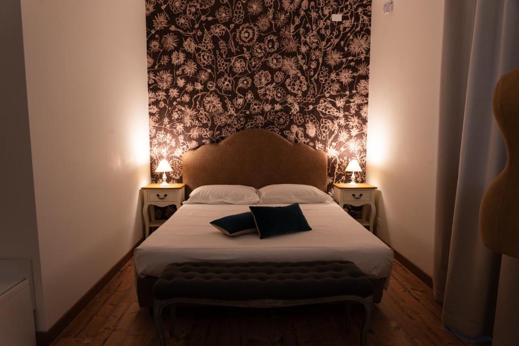 Posteľ alebo postele v izbe v ubytovaní B&B Donna Cinzia