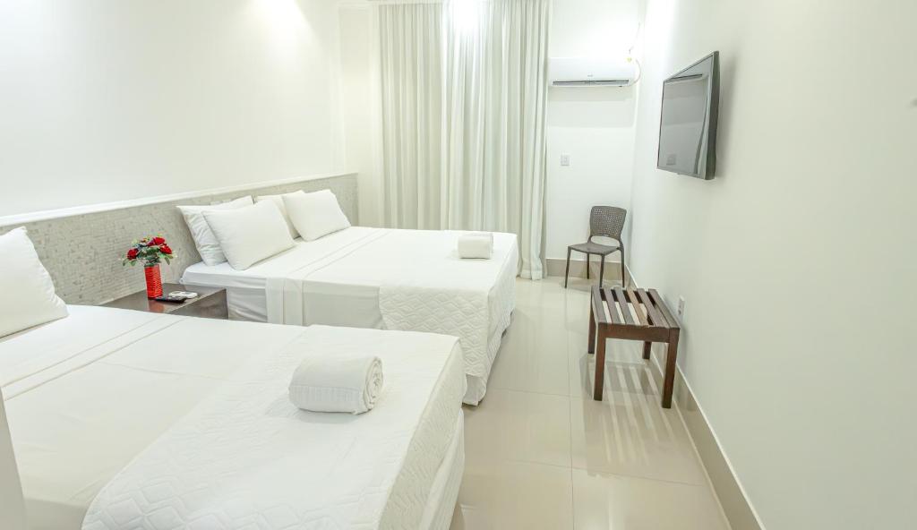 Postel nebo postele na pokoji v ubytování Ramada by Wyndham Porto Seguro Praia