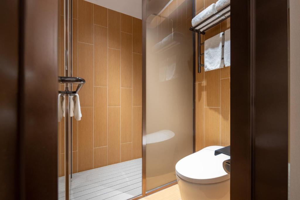 Koupelna v ubytování Bo Ting Hotel泊庭酒店