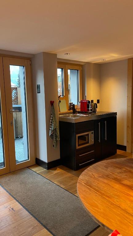 Kuchyň nebo kuchyňský kout v ubytování Chalet Myriam