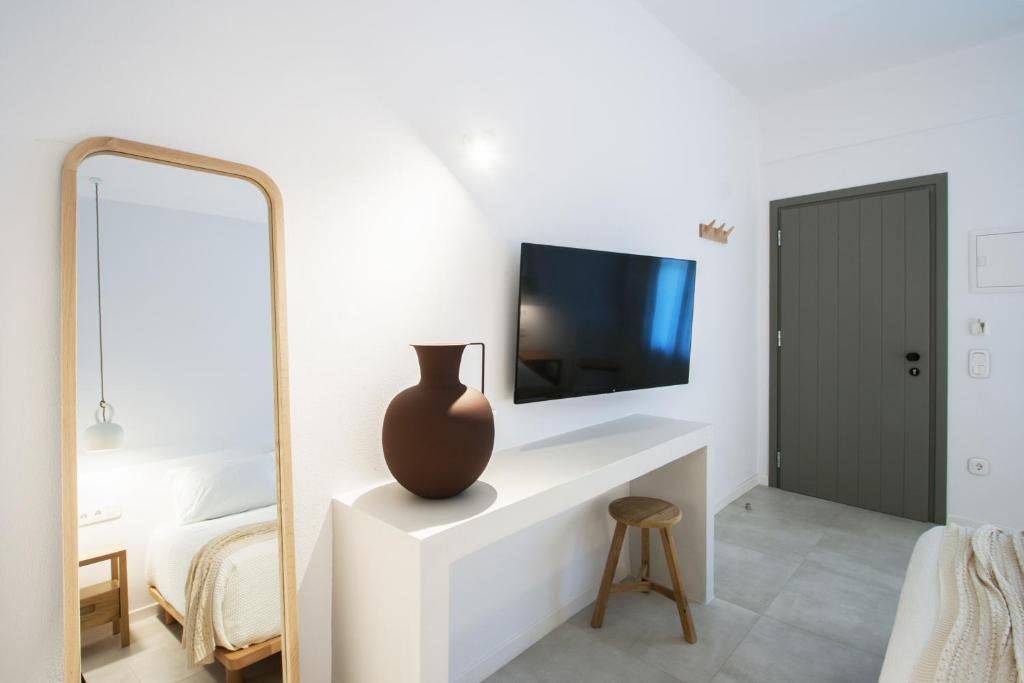 Télévision ou salle de divertissement dans l'établissement Paris Studios & Apartment