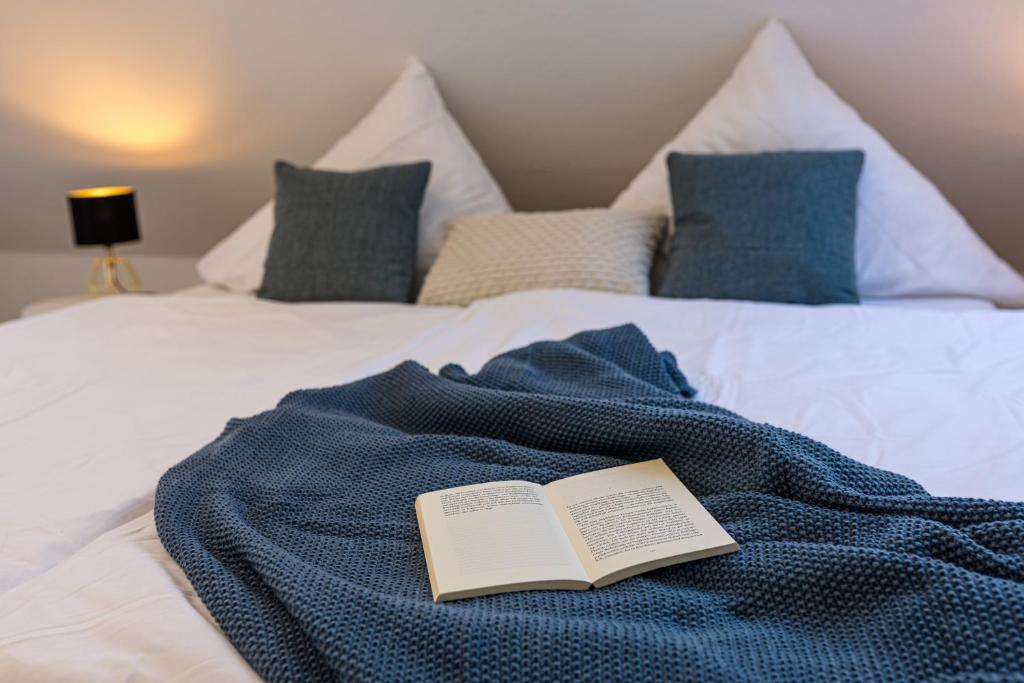 Postel nebo postele na pokoji v ubytování Ferienwohnung Strandkiste