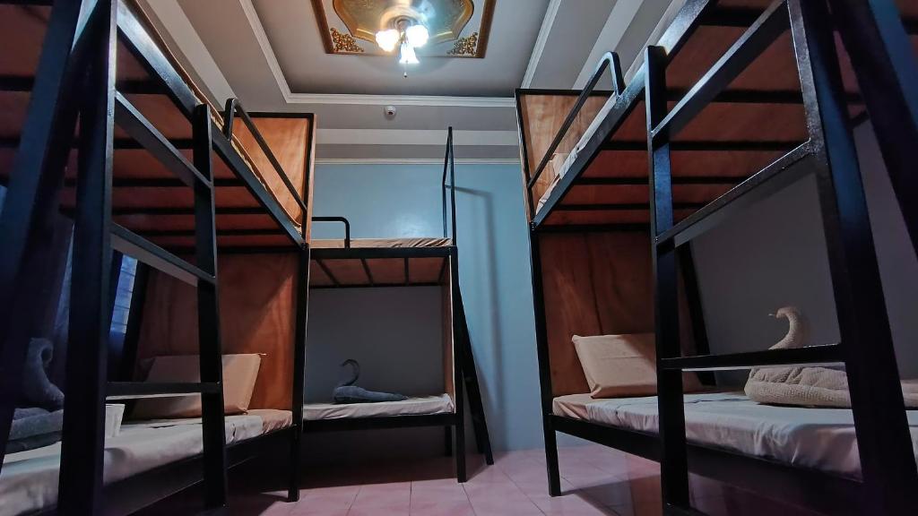 Postel nebo postele na pokoji v ubytování Daydream Dormitory
