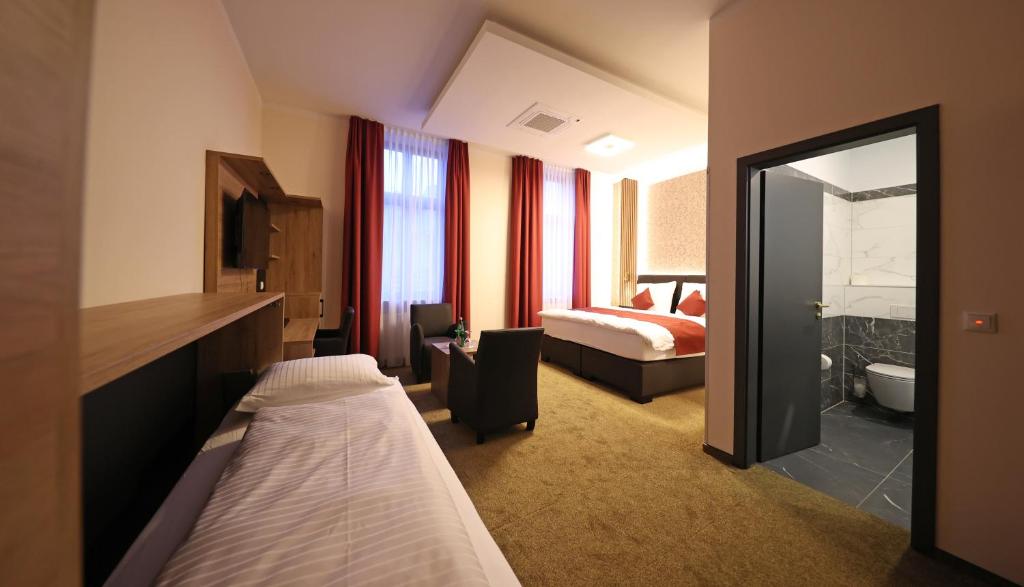 Hotel Golden Pearl Magdeburg im Stadtzentrum - Quarto Triplo Deluxe