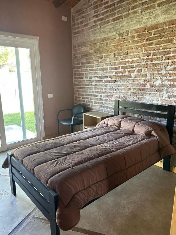 Postel nebo postele na pokoji v ubytování Posada San Polo