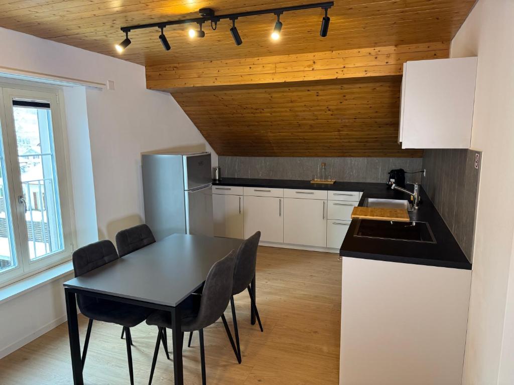 Kuchyň nebo kuchyňský kout v ubytování BigTop-Appartement in Wald