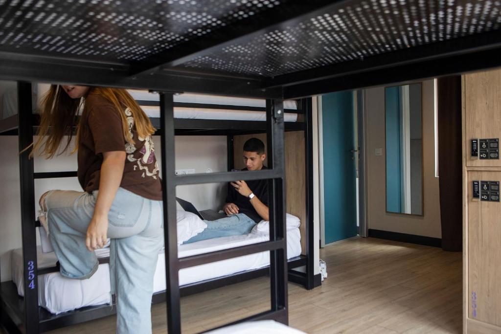 Postel nebo postele na pokoji v ubytování Font Andorra Hostel by Nexta