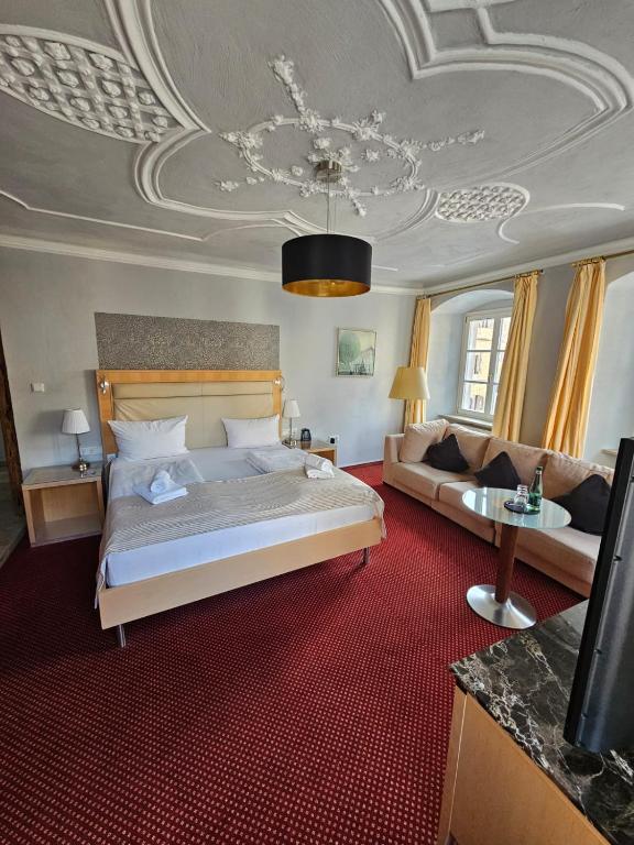 Postel nebo postele na pokoji v ubytování Hotel Goldene Rose