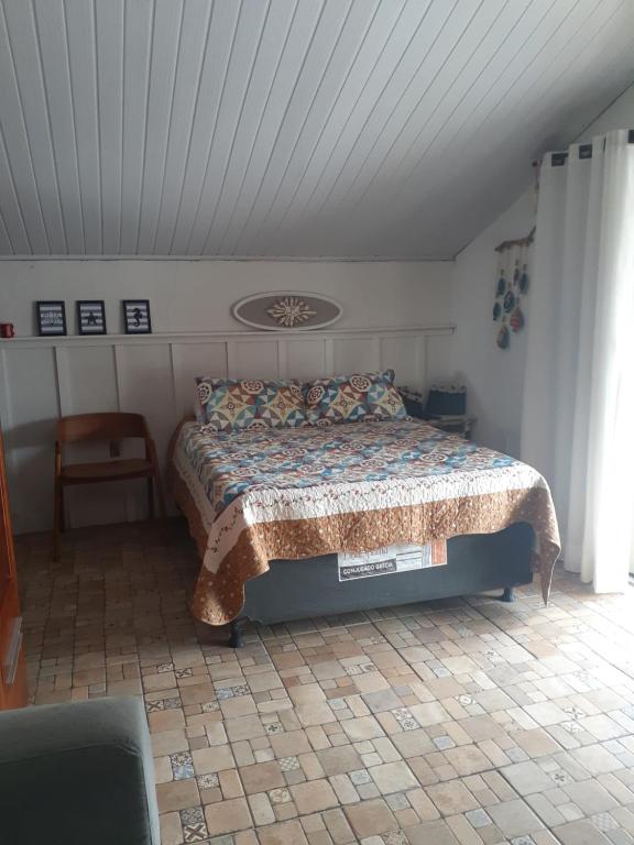 Postel nebo postele na pokoji v ubytování Pousada Suíte Ubatuba 2