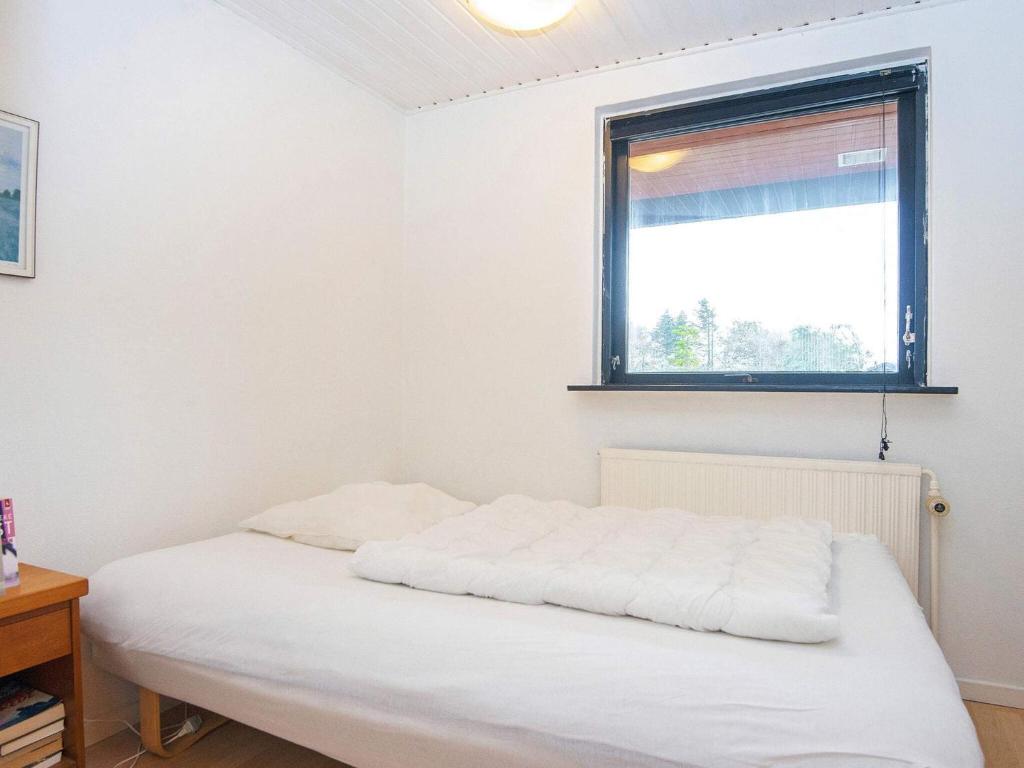 Postel nebo postele na pokoji v ubytování 8 person holiday home in Struer-By Traum