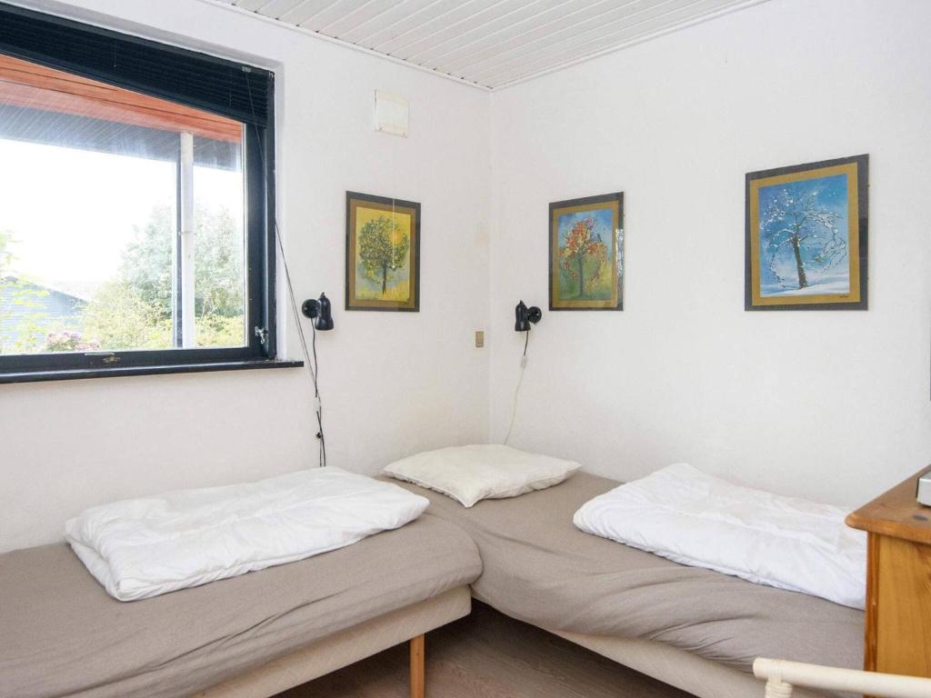 Postel nebo postele na pokoji v ubytování 8 person holiday home in Struer-By Traum