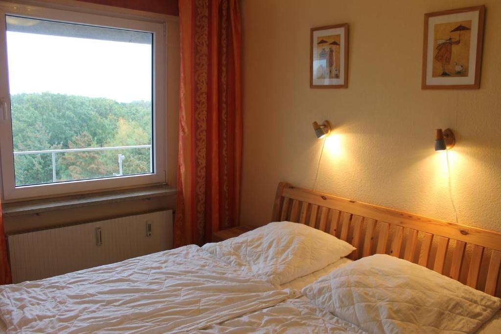 Postel nebo postele na pokoji v ubytování Hanseat II App 184 "Meerblick Grömitz"