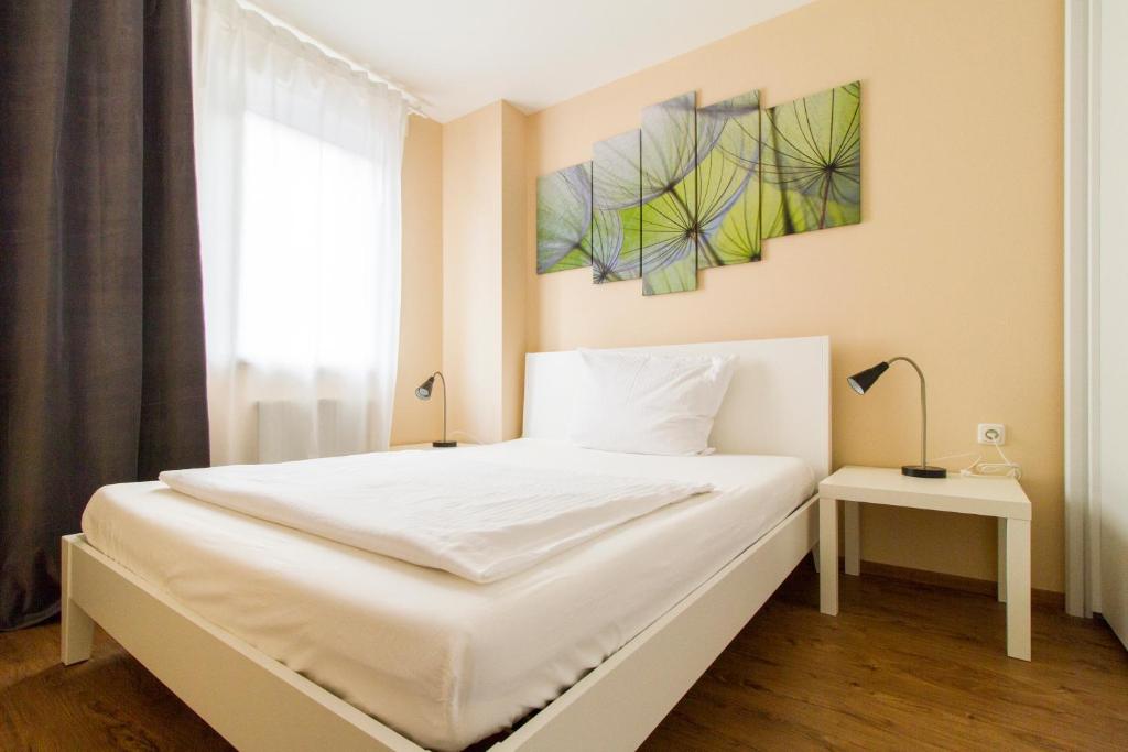 Posteľ alebo postele v izbe v ubytovaní Residenz Donaucity