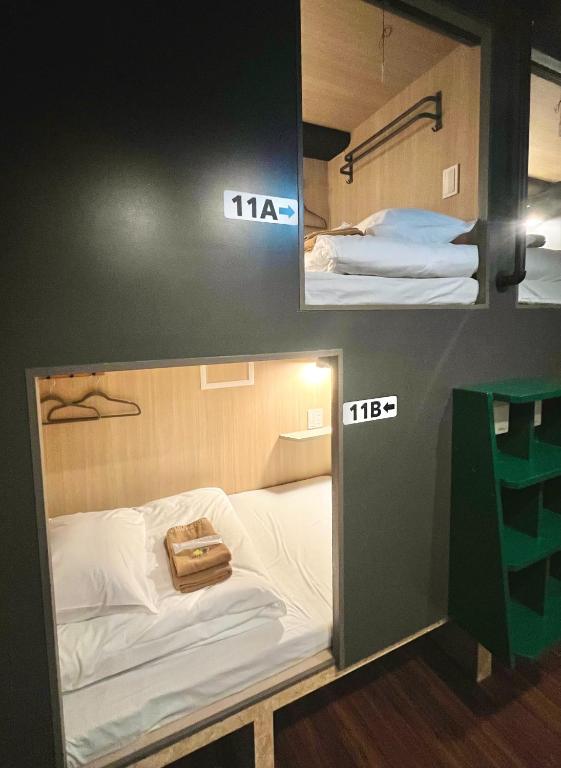 Postel nebo postele na pokoji v ubytování Yoroi Asakusa Hotel