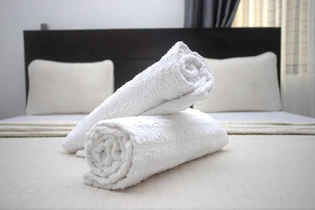 Postel nebo postele na pokoji v ubytování Labev Hotel