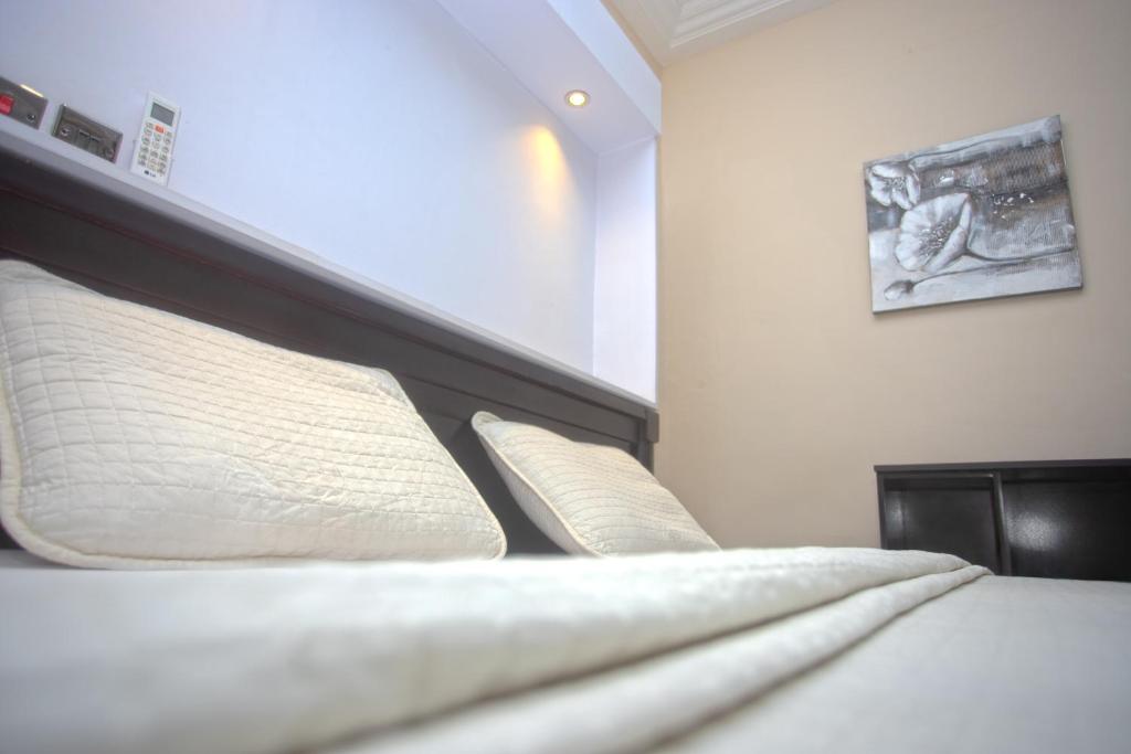 Postel nebo postele na pokoji v ubytování Labev Hotel
