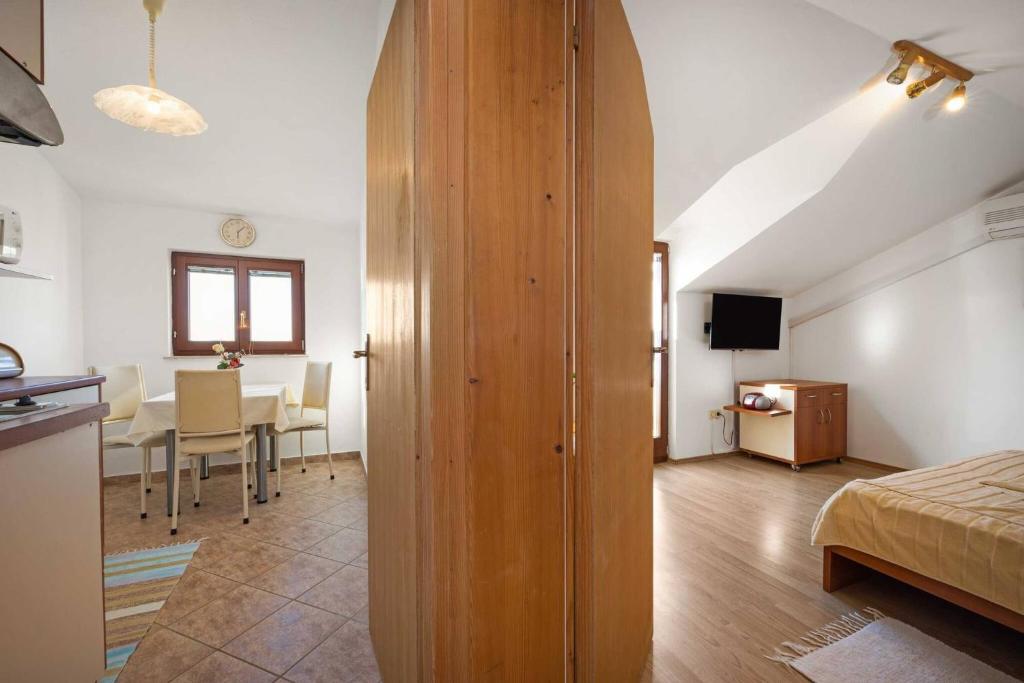 TV a/nebo společenská místnost v ubytování Apartments Kaina