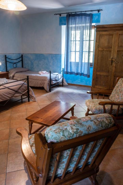 Postel nebo postele na pokoji v ubytování Bio Agriturismo Aia del Tufo