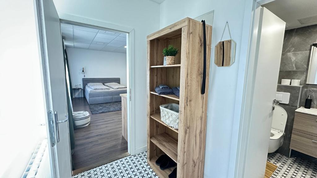 Postel nebo postele na pokoji v ubytování Apartman Vita Lite