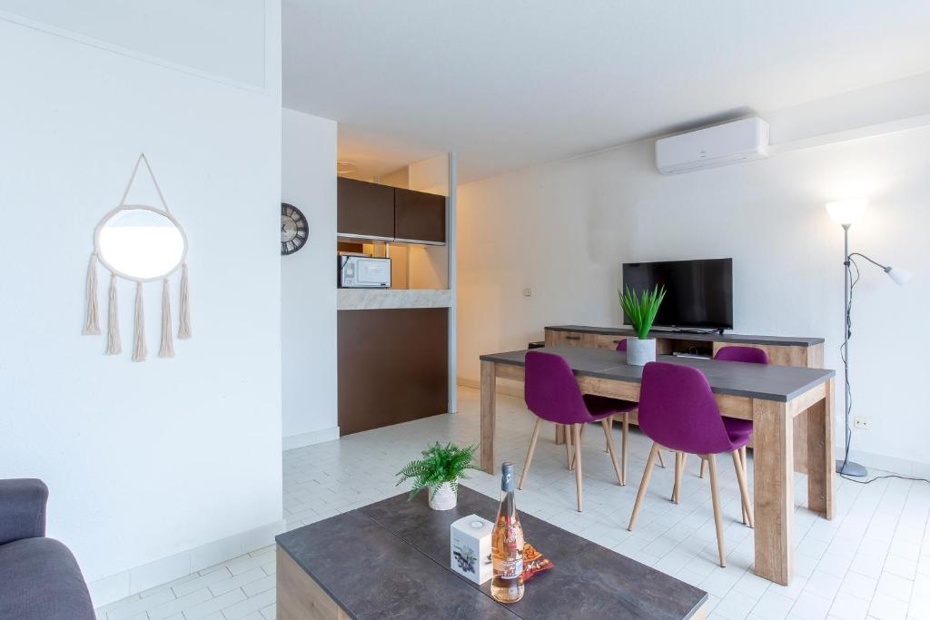 Televízia a/alebo spoločenská miestnosť v ubytovaní Chez Édouard 362 - Superbe appartement en première ligne de la plage