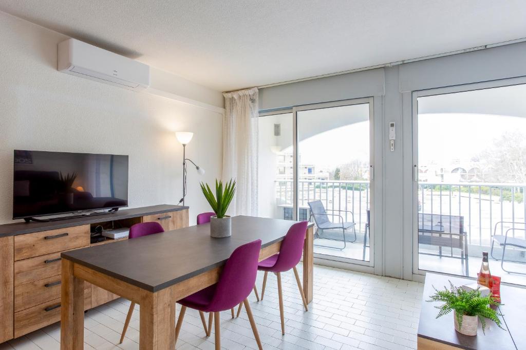Televízia a/alebo spoločenská miestnosť v ubytovaní Chez Édouard 362 - Superbe appartement en première ligne de la plage