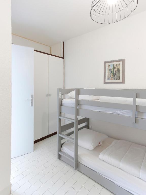 Posteľ alebo postele v izbe v ubytovaní Chez Édouard 362 - Superbe appartement en première ligne de la plage