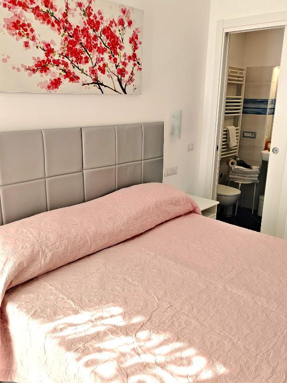 Postel nebo postele na pokoji v ubytování B&B Valentì