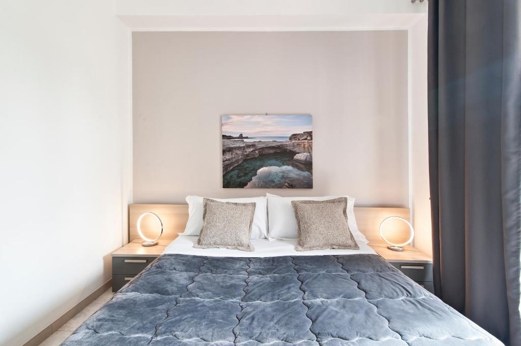 A bed or beds in a room at B&B Kalurya - Lecce Selection