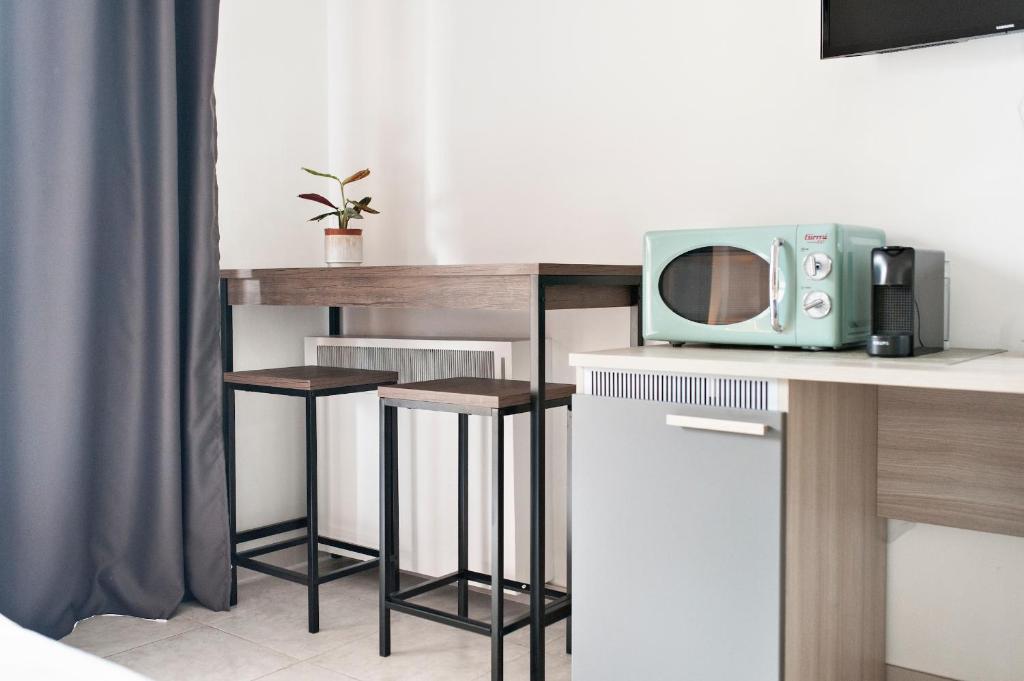 A kitchen or kitchenette at B&B Kalurya - Lecce Selection
