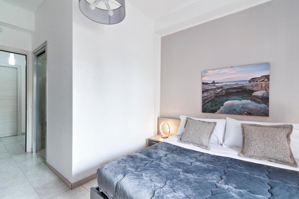 A bed or beds in a room at B&B Kalurya - Lecce Selection