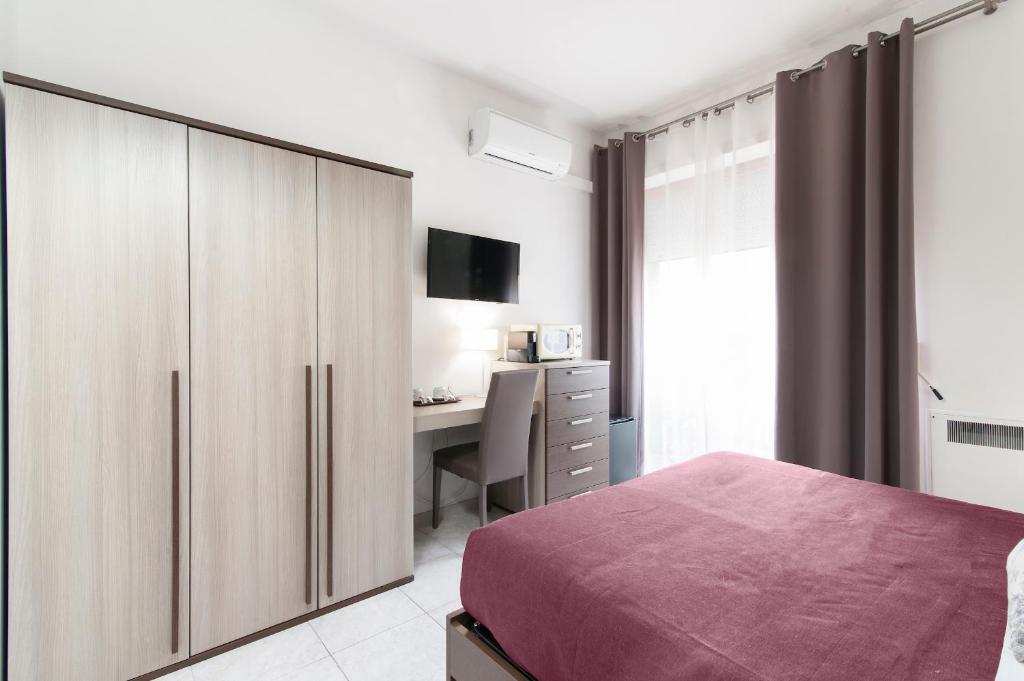 A bed or beds in a room at B&B Kalurya - Lecce Selection