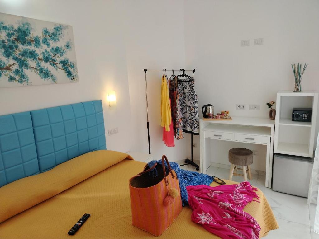 Postel nebo postele na pokoji v ubytování B&B Valentì