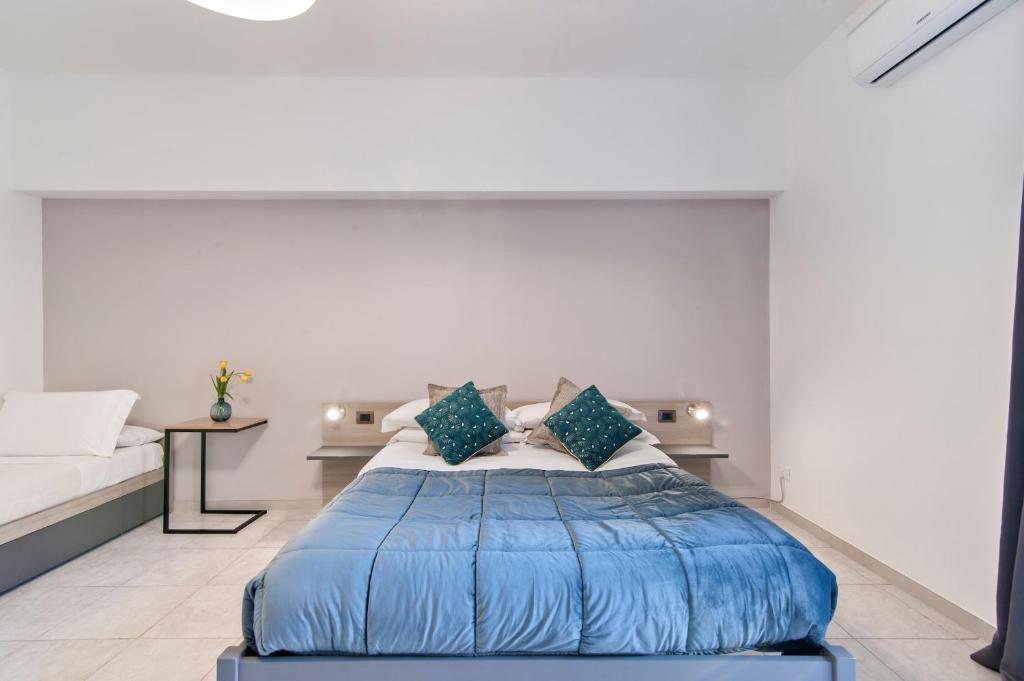 A bed or beds in a room at B&B Kalurya - Lecce Selection