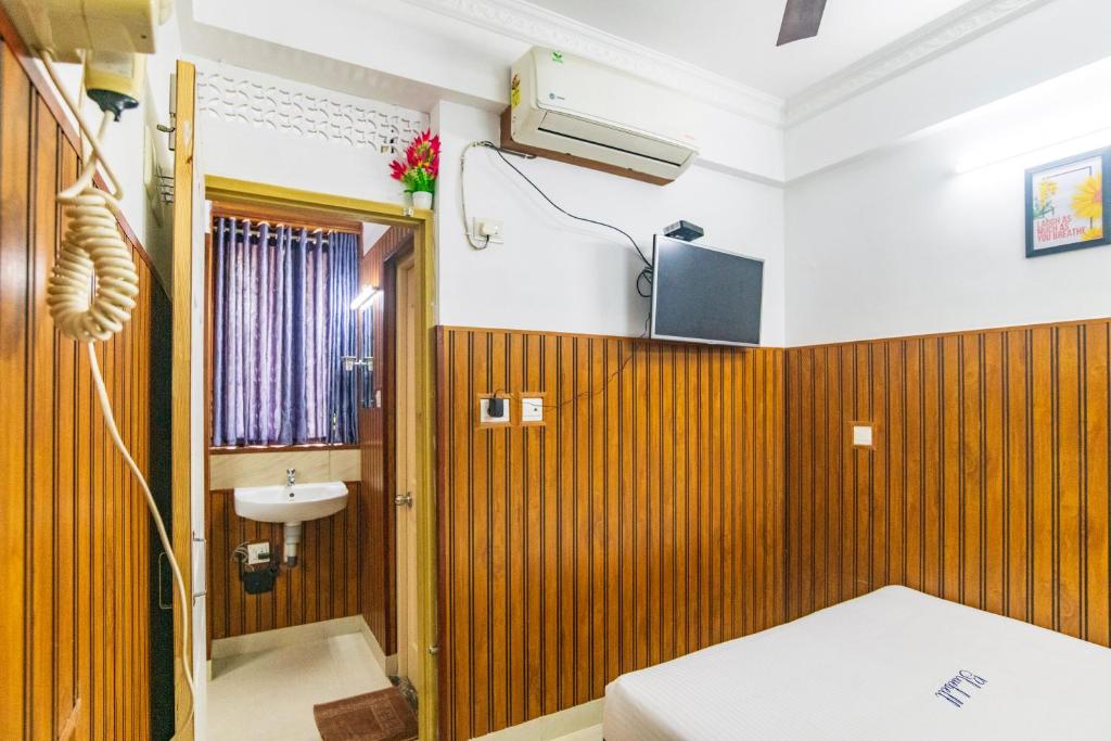 Postel nebo postele na pokoji v ubytování Blue Bell Hotel