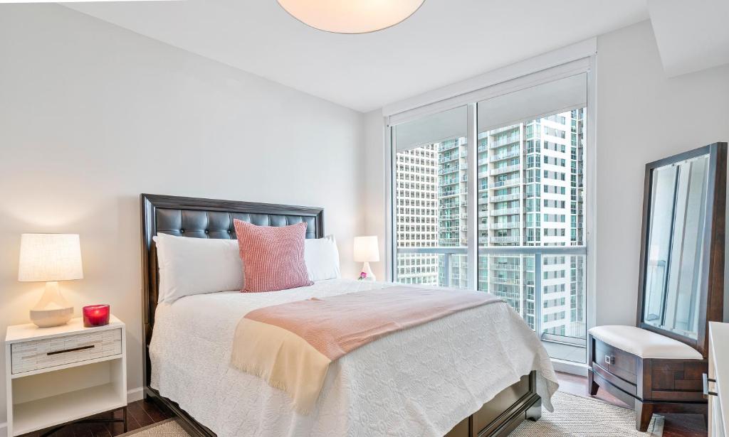 Postel nebo postele na pokoji v ubytování Brickell by Miami Vacation Rentals