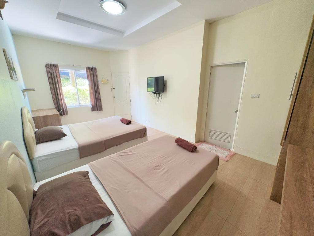 Postel nebo postele na pokoji v ubytování Krabi Ava Hill