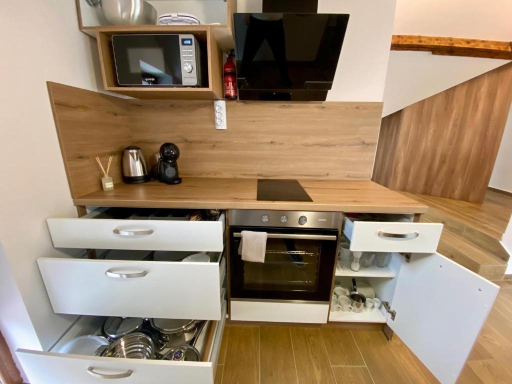 TV a/nebo společenská místnost v ubytování AERO Apartmaji Lesce-Bled
