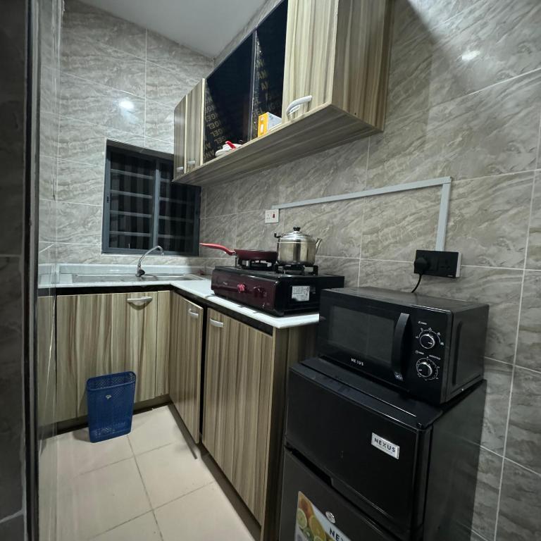 Kuchyň nebo kuchyňský kout v ubytování SATELLITE APARTMENT The Classic Studio 7