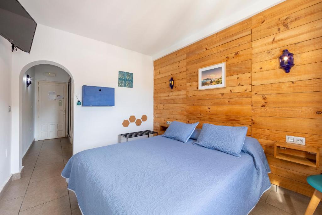 Postel nebo postele na pokoji v ubytování Boutique Hotel El Olivar