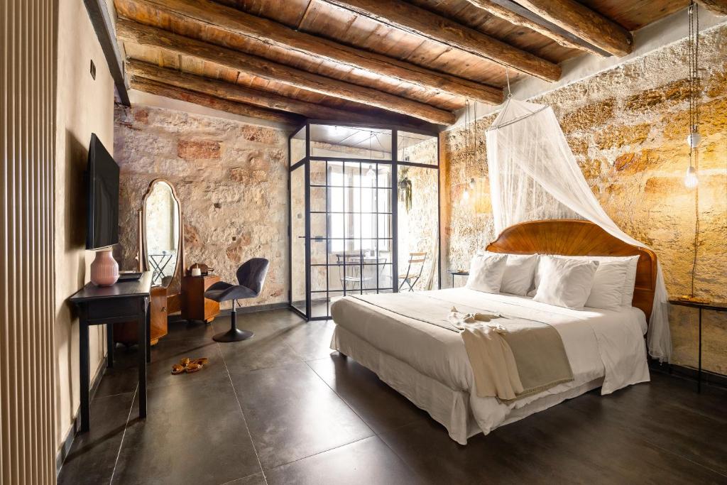 A bed or beds in a room at Guccia home