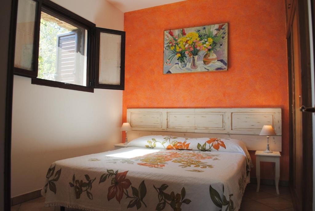 Postel nebo postele na pokoji v ubytování Residencefusaro pajare Specchia