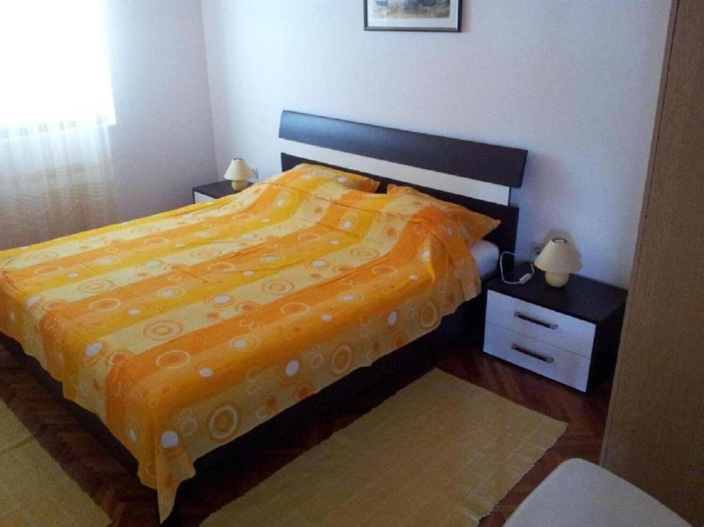 Postel nebo postele na pokoji v ubytování Apartment Mila