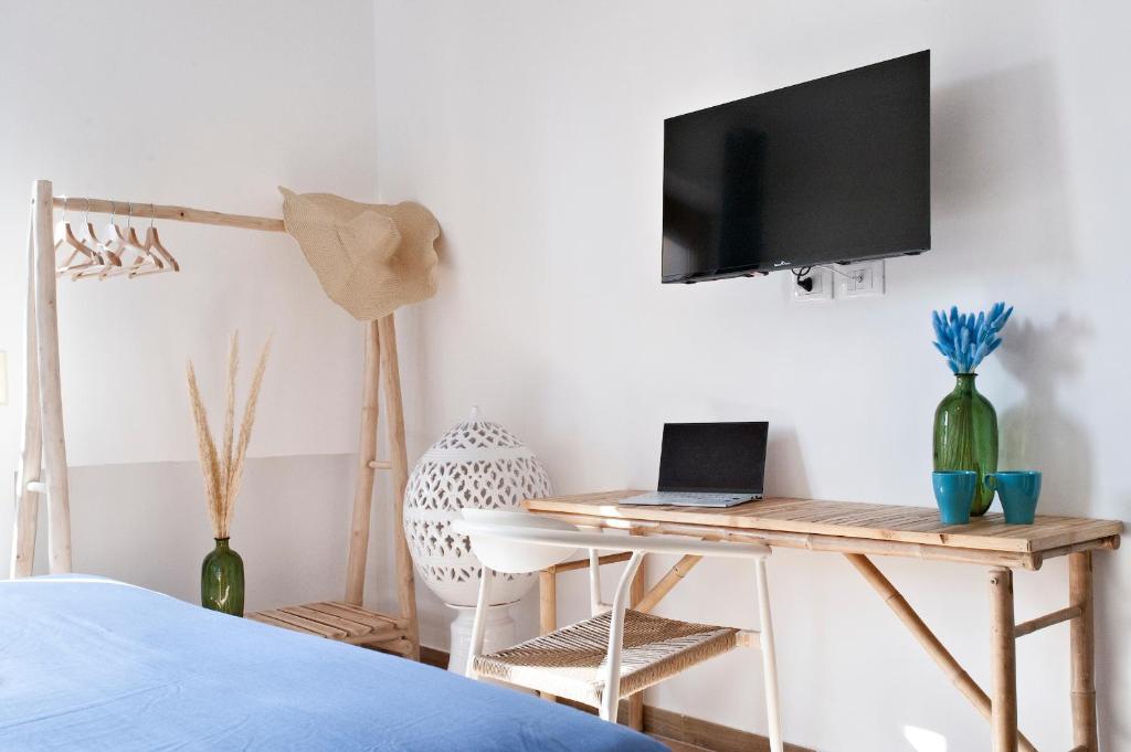 TV a/nebo společenská místnost v ubytování 7Rooms - Lecce Selection