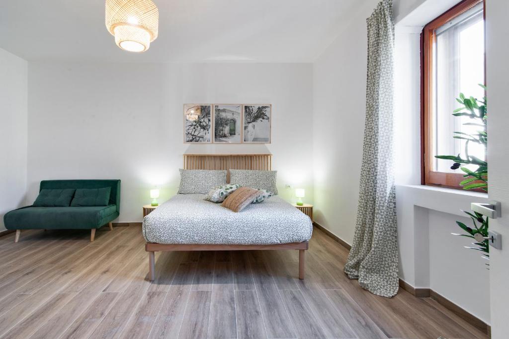Postel nebo postele na pokoji v ubytování 7Rooms - Lecce Selection