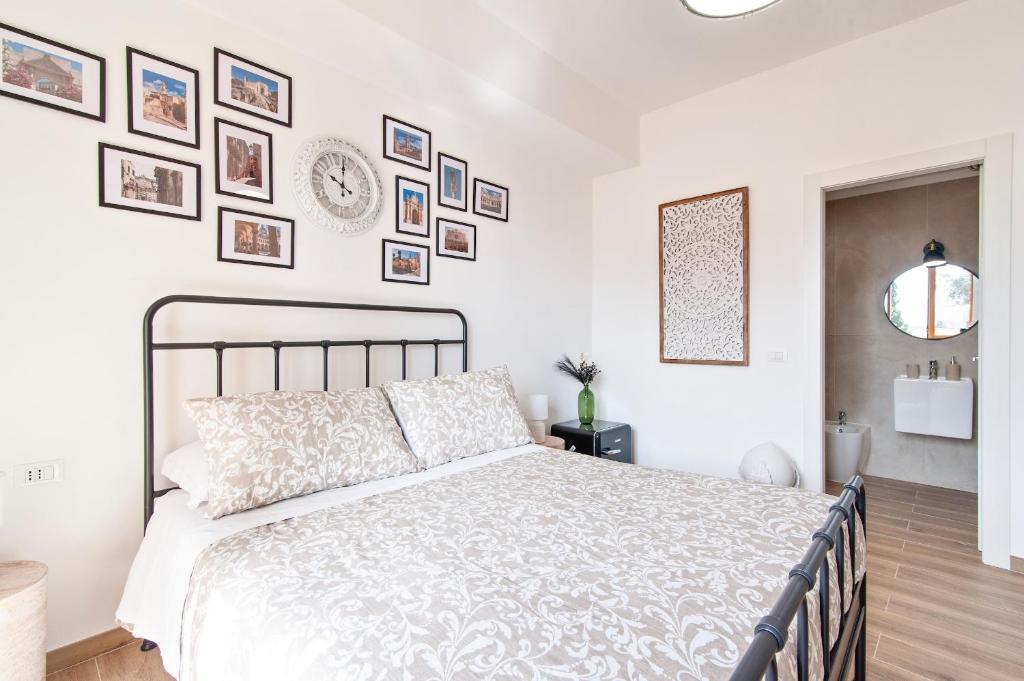 Postel nebo postele na pokoji v ubytování 7Rooms - Lecce Selection
