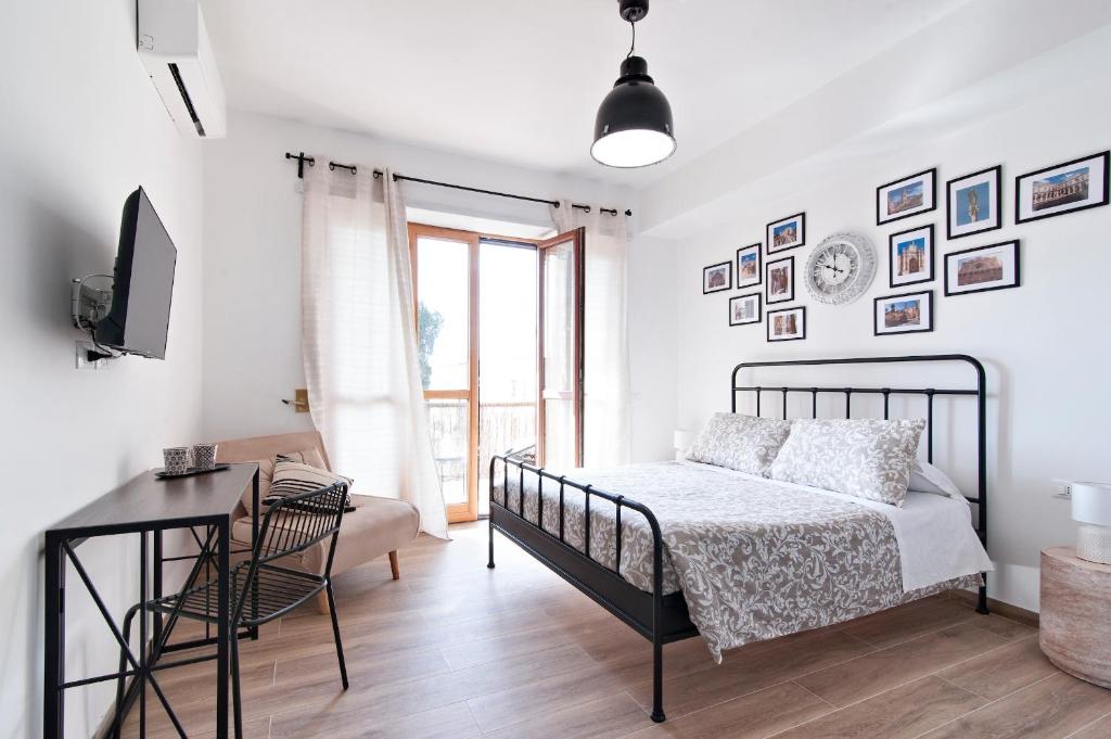 Postel nebo postele na pokoji v ubytování 7Rooms - Lecce Selection